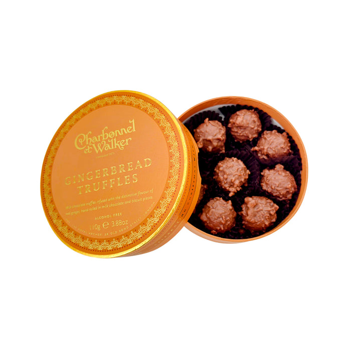 A round Charbonnel & Walker Gingerbread Truffles, 110g gift box with an open lid, containing six milk chocolate truffles with a textured, crunchy-looking coating.
