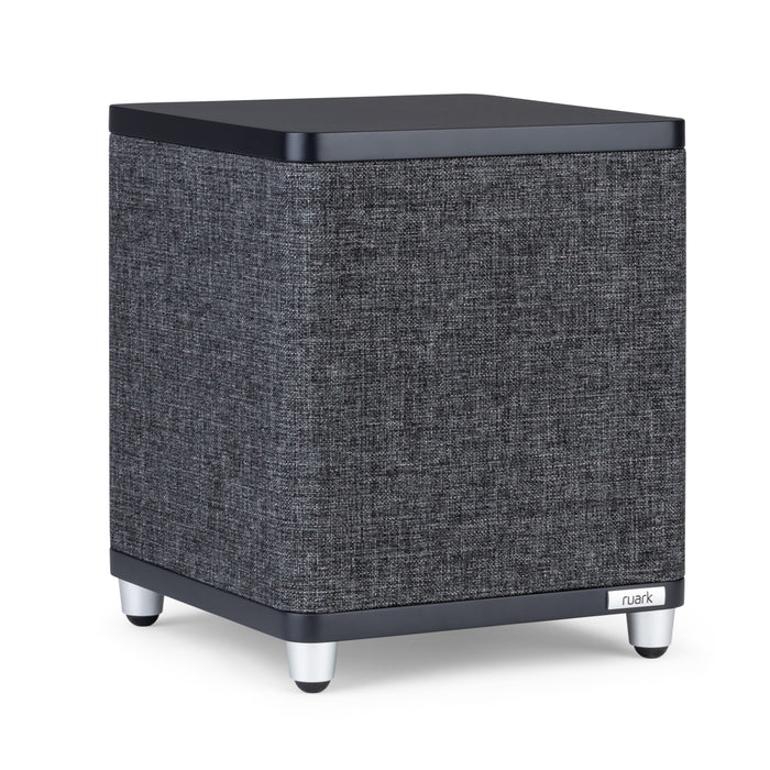 The Ruark RS1 Subwoofer features a square, modern design with dark gray fabric sides, black top, silver feet, and a discreet Ruark logo on the front—engineered for premium audio and deep bass from the renowned Ruark brand.