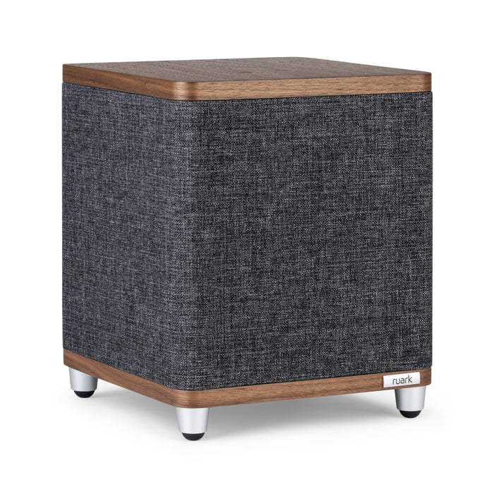 The Ruark RS1 Subwoofer features a modern dark gray fabric body, wooden top and base, silver legs, and a discreet ruark logo—delivering premium audio quality and powerful bass extension.
