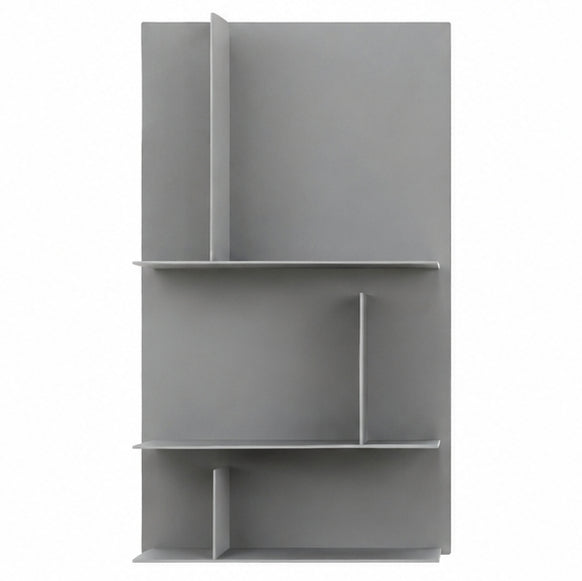 The Avenue Library Shelving H96cm by Kristalia features a minimalist gray wall-mounted design with asymmetrical vertical and horizontal dividers that create varied storage compartments, making this contemporary bookcase stand out against a white background.