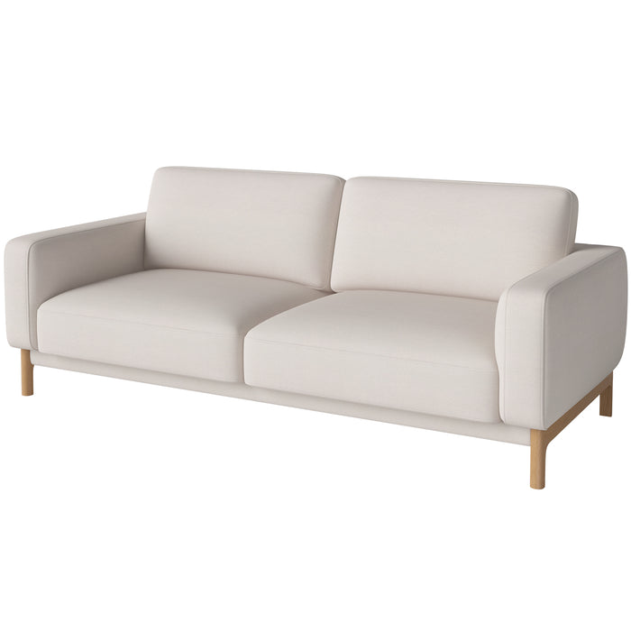 The Chleo 2.5 Seater Sofa by Bolia is a modern, light beige sofa featuring two seat and back cushions, wide armrests, removable covers, and wooden legs, shown against a plain white background.