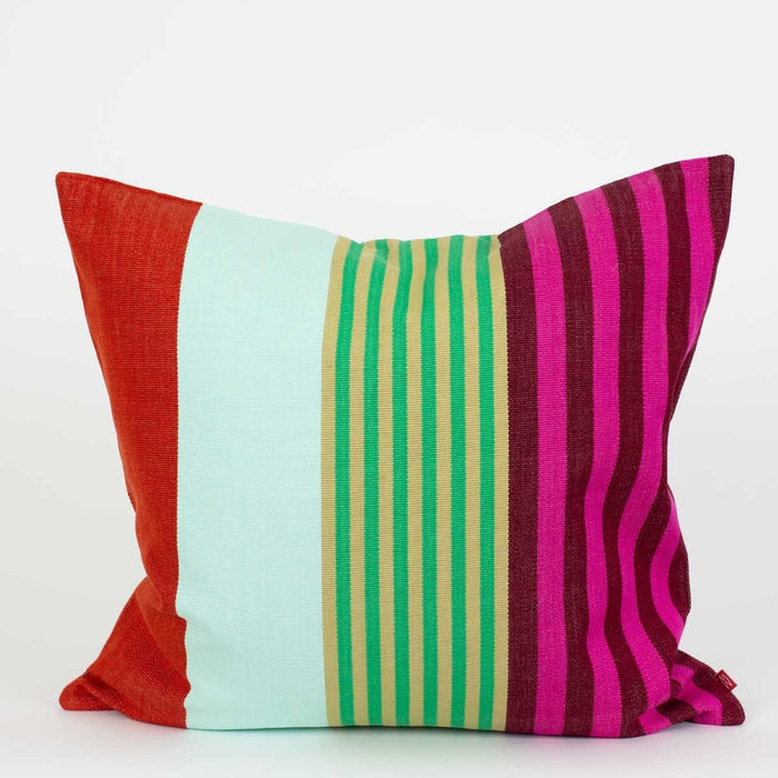 Introducing the Gloriana Cushion by World Of Craft—a square, handwoven pillow featuring bold vertical stripes in red, turquoise, green, yellow, burgundy, and magenta on a crisp white background. This vibrant Guatemalan cushion brings artisanal charm and colorful energy to any space.