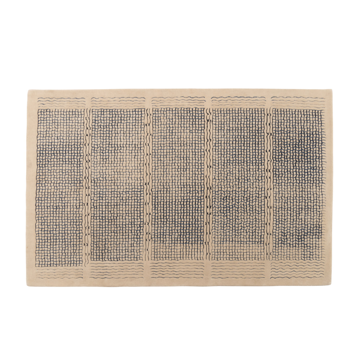 Ligne Roset Katagami Rug in hand-tufted New Zealand wool featuring a dark bouclé grid pattern divided into four vertical sections with wavy horizontal lines at the top and bottom.