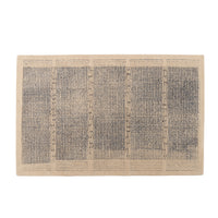 Ligne Roset Katagami Rug in hand-tufted New Zealand wool featuring a dark bouclé grid pattern divided into four vertical sections with wavy horizontal lines at the top and bottom.