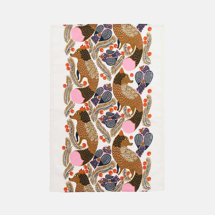 The Ketunmarja Kitchen Towel by Marimekko showcases a white cotton-linen fabric adorned with a vertically repeating pattern of brown birds, blue leaves, orange berries, and pink circles. This eye-catching towel brings a fresh twist to your Marimekko Christmas Edition décor.