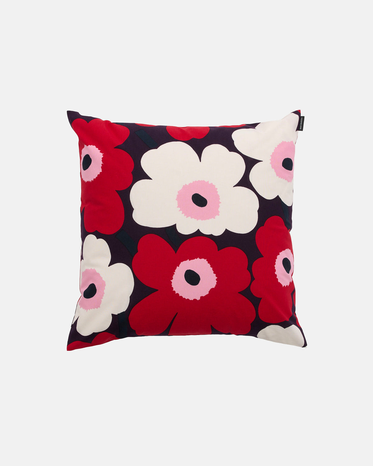 Add a burst of color to your space with the Marimekko Pieni Unikko Cushion Cover. Featuring a bold floral pattern in vibrant red, white, and pink on a dark background, this square cushion cover showcases simple flower shapes with round centers and playful petal designs. Made from 100% cotton for lasting comfort and style, it’s the perfect accent to brighten any room.