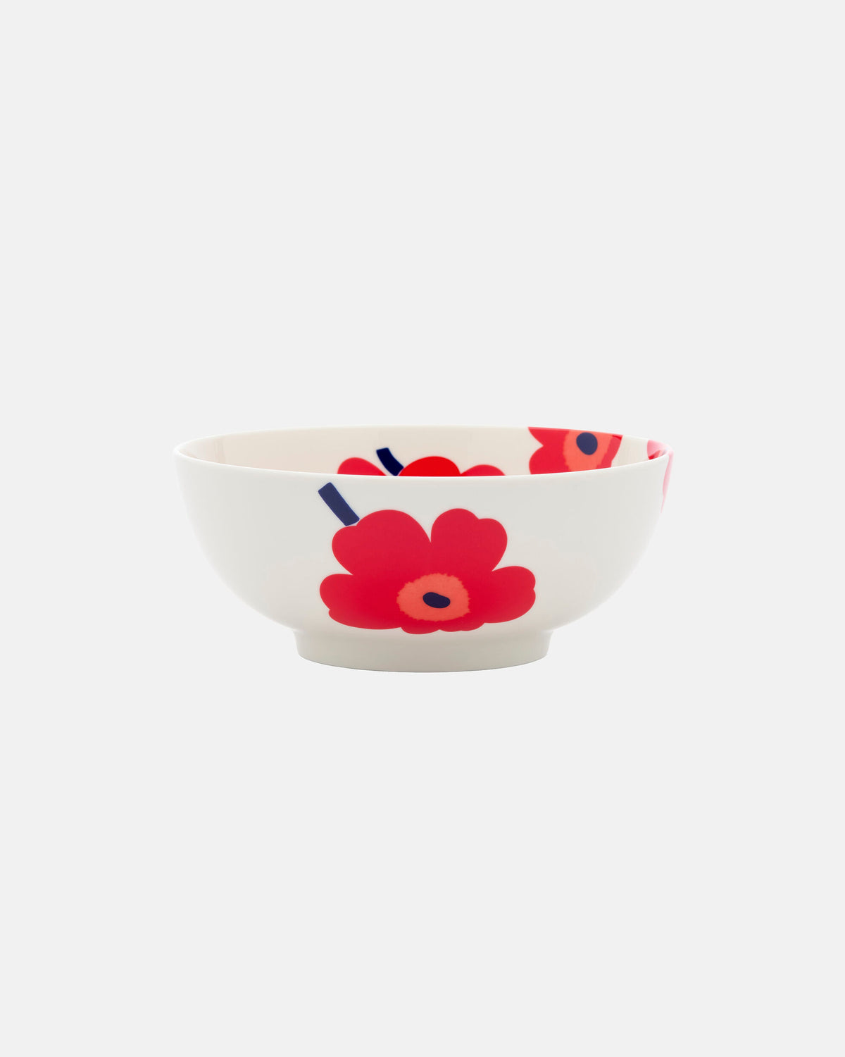 The Marimekko Oiva / Unikko Bowl 1.3l is a white ceramic serving bowl adorned with the iconic red and pink Unikko floral pattern and dark blue accents against a plain white background.