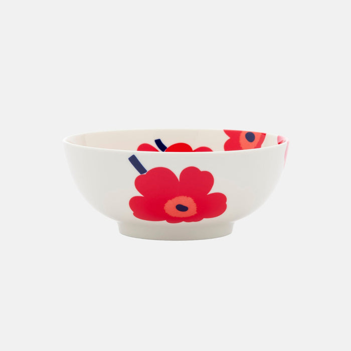 The Marimekko Oiva / Unikko Bowl 1.3l is a white ceramic serving bowl adorned with the iconic red and pink Unikko floral pattern and dark blue accents against a plain white background.