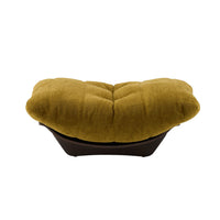 Mustard-colored Marsala footstool in Festa fabric with a tufted top and a dark brown curved base.