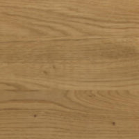 The Eaton Dining Table by Ligne Roset features a light brown European walnut surface showcasing visible grain patterns and a subtle natural texture.