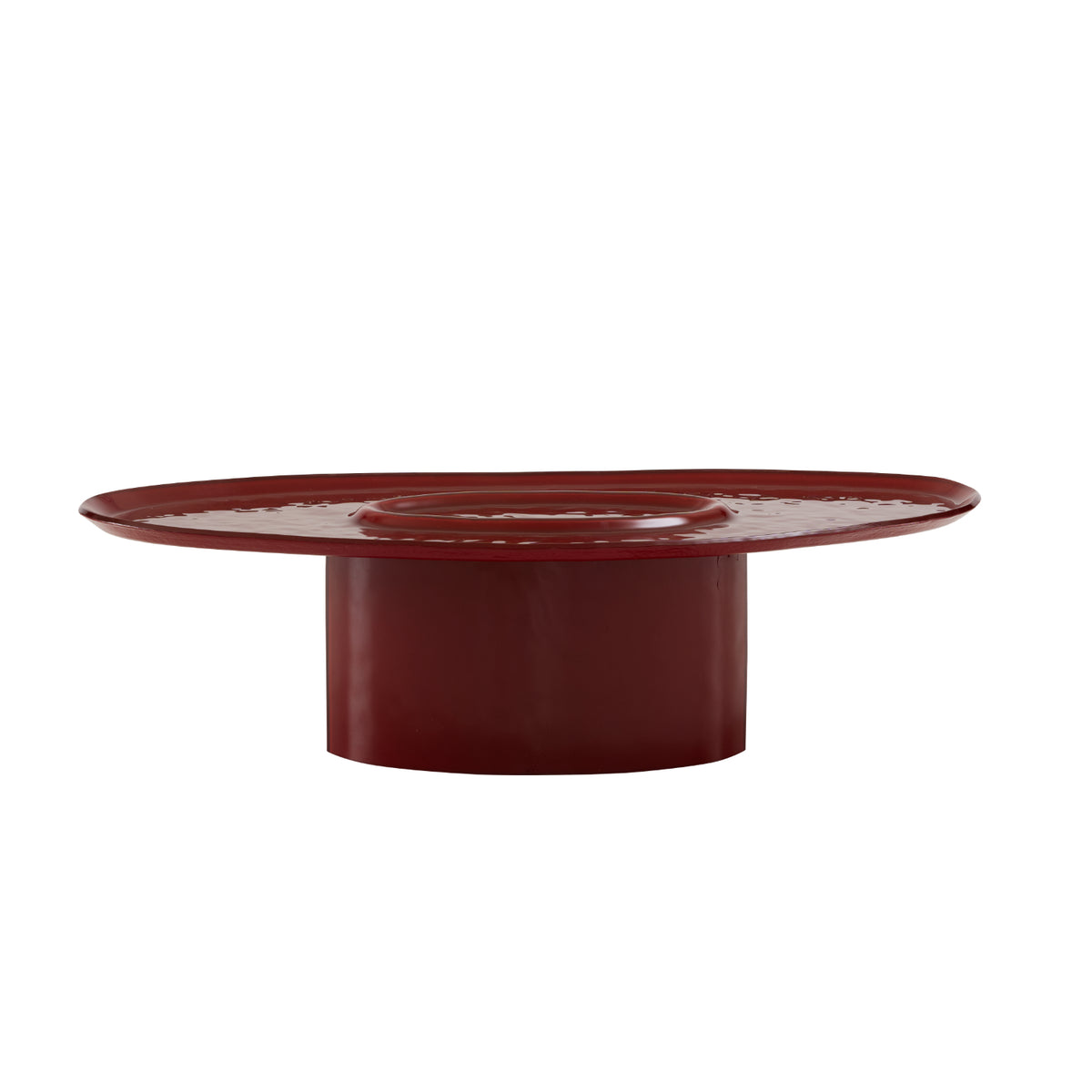 Deep red Oasi Low Table featuring an asymmetrical, tray-like surface resting on a cylindrical base made of hammered red lacquered glass.
