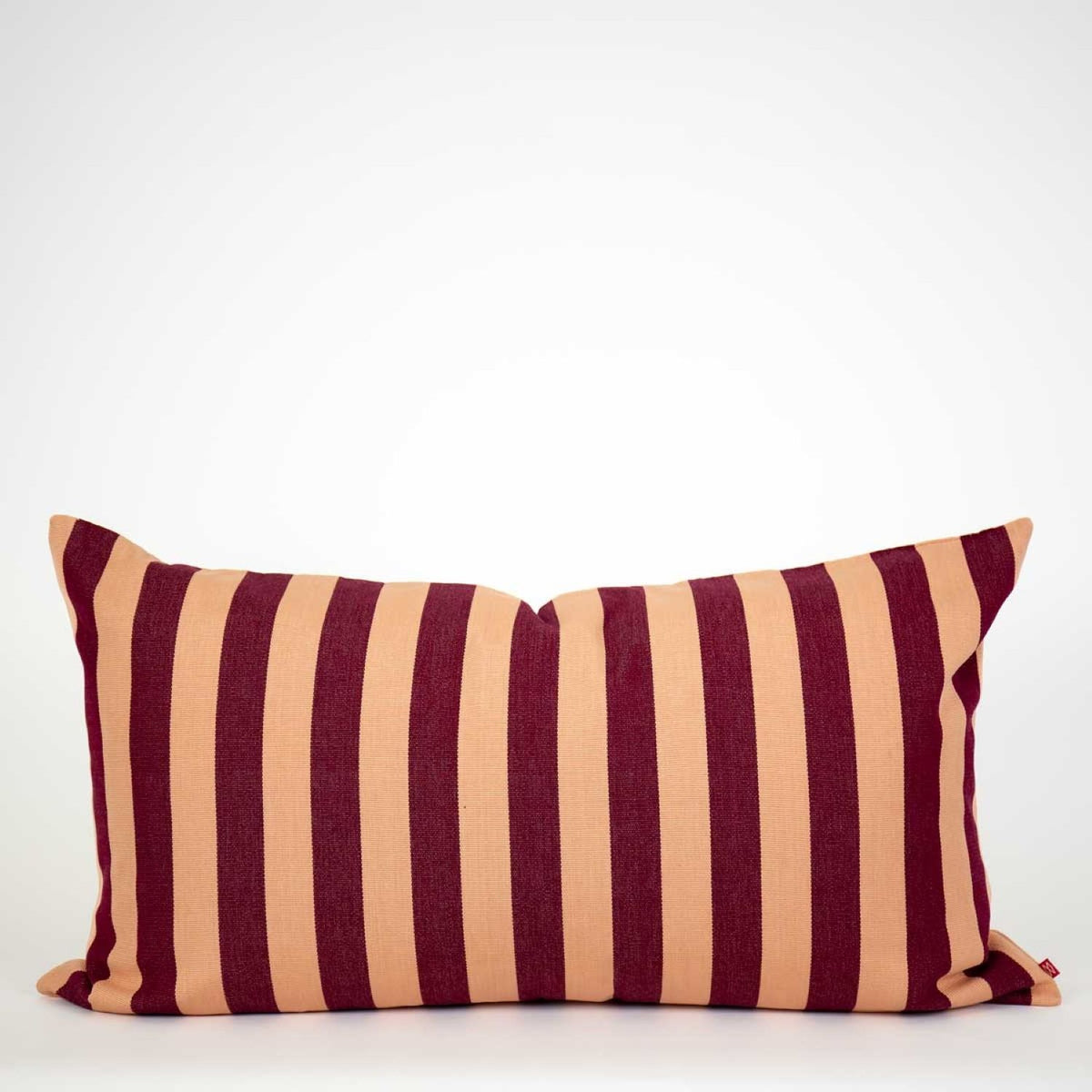 The Ona Cushion by World Of Craft features vertical maroon and beige stripes in a rectangular design, handwoven by Guatemalan artisans. This fair trade product is beautifully crafted and displayed against a plain white background.