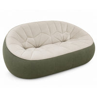 Low-profile Ligne Roset Ex-Display Ottoman 2-Seat Sofa featuring a cream-colored, tufted cushion set within a dark green rounded frame.