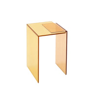 The Patchs Occasional Table by Ligne Roset is a small, modern side table crafted from translucent orange acrylic, featuring clean lines and a minimalist design that seamlessly combines style and functionality for any living space.
