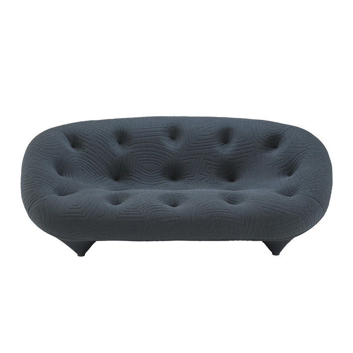 Discover the Ex-Display Ploum Medium High Back Sofa by Ligne Roset—a modern sofa in Sea Fabric Grey, inspired by the iconic Ploum design. This piece features a rounded back and seat with textured fabric and low, angled legs, creating a distinctly contemporary silhouette.