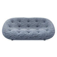Ex-Display Ploum Medium High Back Sofa in grey Sea fabric, featuring a low-profile curved design with tufted button detailing.