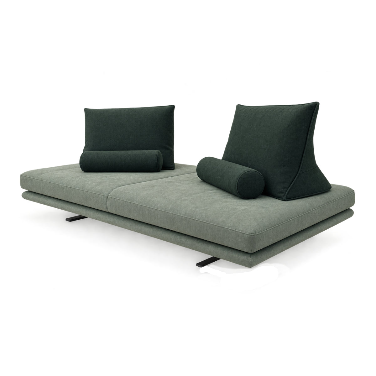 Introducing the Ex-Display Prado Medium Sofa by Ligne Roset—an Alcantara-upholstered modern green settee inspired by the iconic Prado Sofa, featuring two rectangular back cushions and two cylindrical bolster pillows, all supported by slim black legs for a stylish and versatile look.