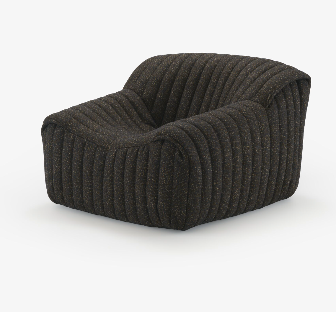 The Sandra Armchair, Vanir by Ligne Roset is a modern dark brown upholstered lounge chair with thick vertical channel tufting and a wide, deep seat, pictured against a plain white background.