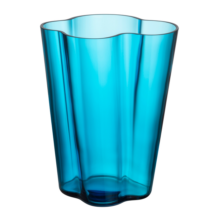 The Alvar Aalto Vase, 270 mm, features a translucent blue color with flowing, wavy edges and a modern organic shape inspired by Finnish design. The empty vase is showcased against a white background.