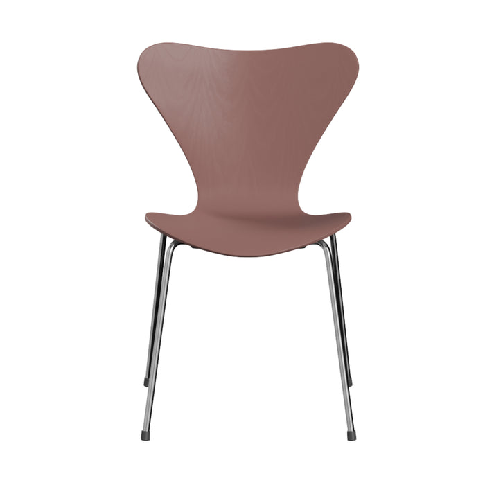 A contemporary chair by Fritz Hansen, the Series 7 Chair in Wild Rose features a gracefully curved seat and backrest in a distinctive rose hue, supported by four sleek metal legs. Inspired by Arne Jacobsen’s iconic Danish design, this piece showcases minimalist elegance and timeless modern style.