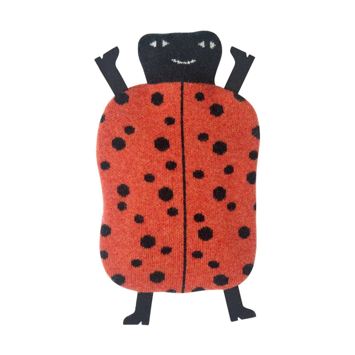 The Donna Wilson Ladybird Hot Water Bottle features a soft, plush design with a red, black-spotted body, a smiling black head, and black arms and legs. It is shown lying on a white background.