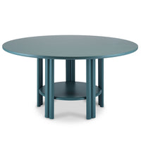 The Saba Anam Dining Table features a modern round teal design with a smooth top, multiple cylindrical legs, and a connecting circular lower shelf—an ideal centerpiece for any stylish dining space.