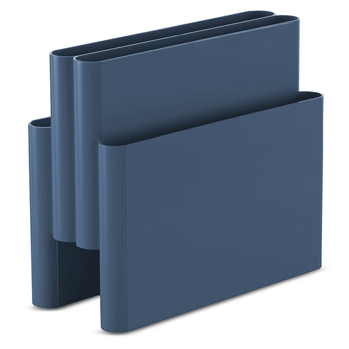 The Kartell Magazine Rack is a blue, modern organizer with three slots and a sleek, rounded design, inspired by mid-century Italian style. It stands upright against a white background.