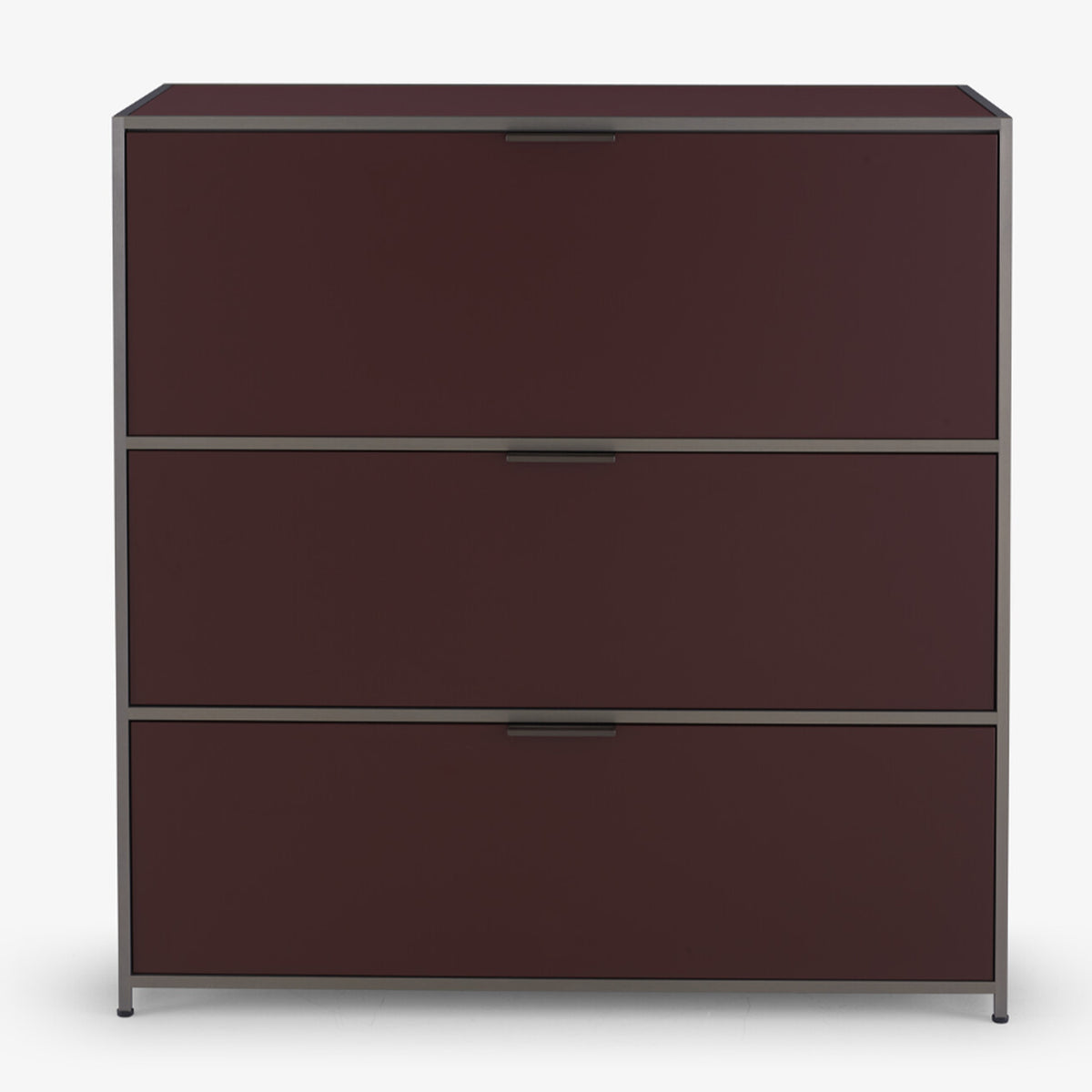 The Dita Secretaire Desk by Ligne Roset is a modern burgundy filing cabinet with three drawers, a minimalist metal frame, and sleek handles. It stands on a flat surface against a plain white background—a refined storage solution.