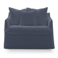 A Gervasoni Ex-Display Ghost Single Sofa Bed 11 in dark blue with three large matching pillows and a removable cover, shown against a plain white background.
