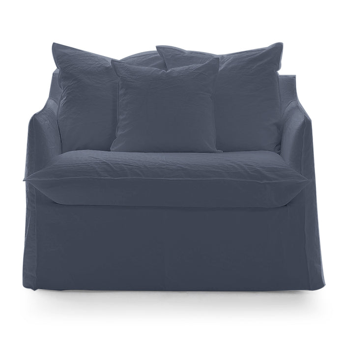 A Gervasoni Ex-Display Ghost Single Sofa Bed 11 in dark blue with three large matching pillows and a removable cover, shown against a plain white background.