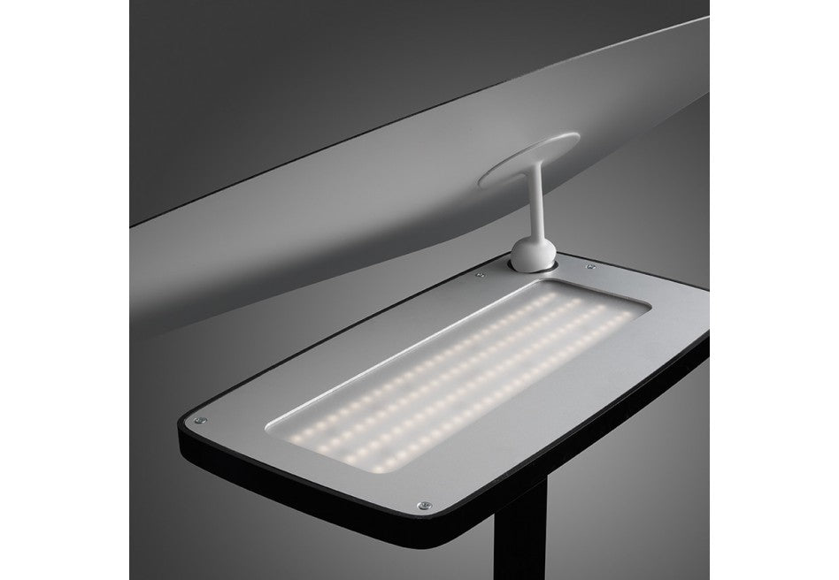 Rectangular head of an Ex-Display Lightwing Floor Light, White, featuring a grid of internal LED lights and an attached white adjustment handle.