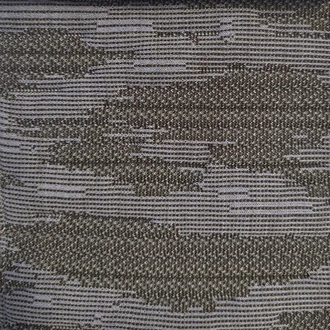 Close-up of the grey textured fabric with an abstract horizontal pattern characteristic of the Ex-Display Ploum Medium High Back Sofa, Sea Fabric Grey by Ligne Roset.