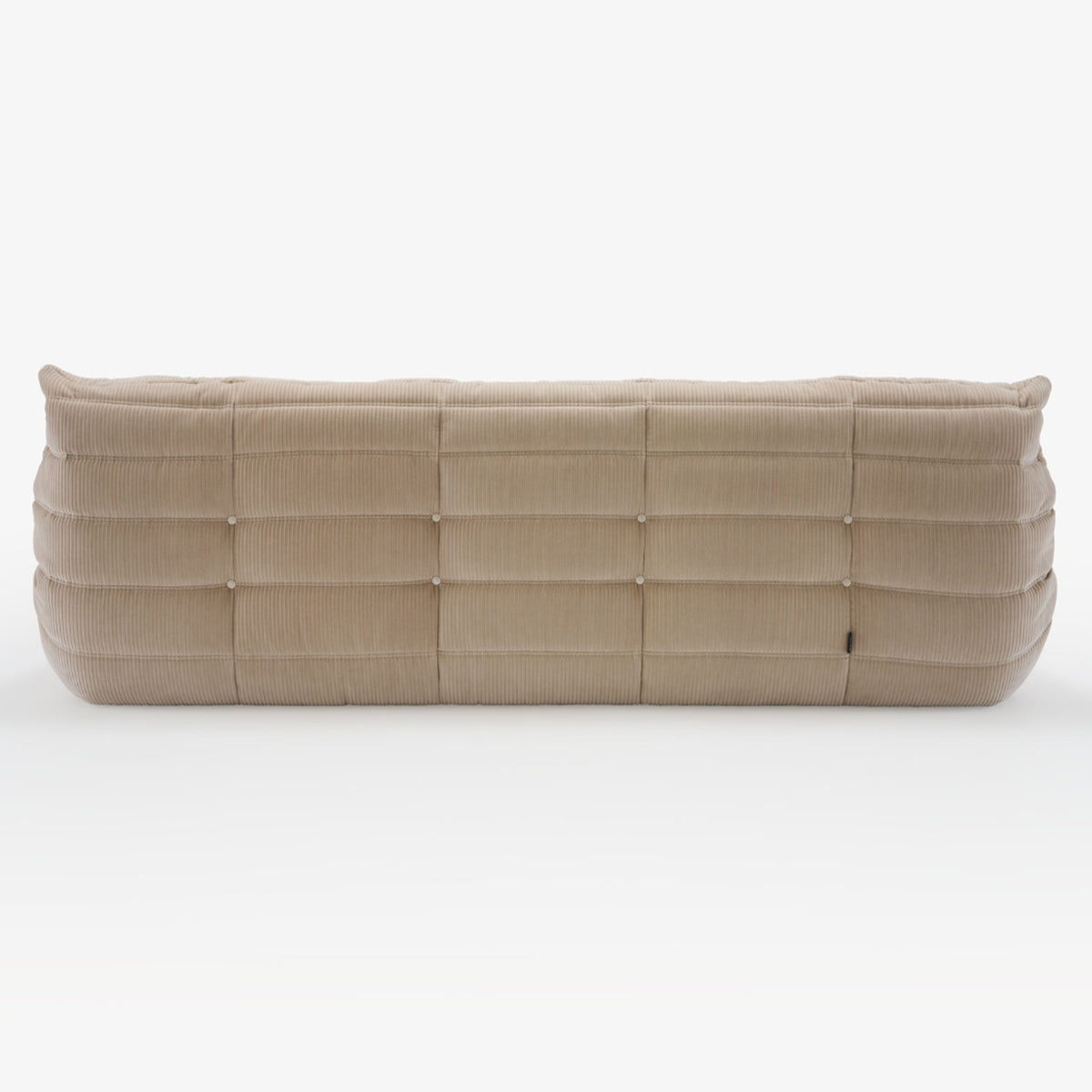 A Togo Very Large Sofa in Phlox fabric by Ligne Roset is viewed from the back, showcasing its quilted, grid-like pattern and soft, plush appearance.