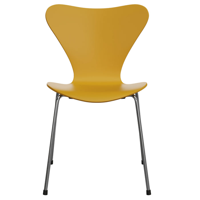 The Fritz Hansen Series 7 Chair by Verner Panton features a modern yellow finish, butterfly-shaped backrest, and four slender metal legs, inspired by Danish design and shown from the front against a plain white background.