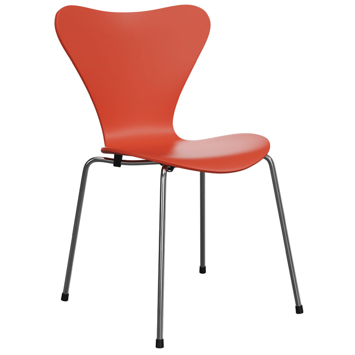 The Series 7 Chair by Verner Panton for Fritz Hansen is a modern red chair with a curved, butterfly-shaped backrest and seat, supported by four slim silver metal legs, inspired by Danish design.